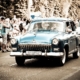 Oldtimer, von Passanten bejubelt